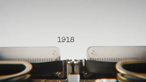 Old mechanical typewriter typing Year 1918 in a close-up view, with metal Stock Footage 321452480