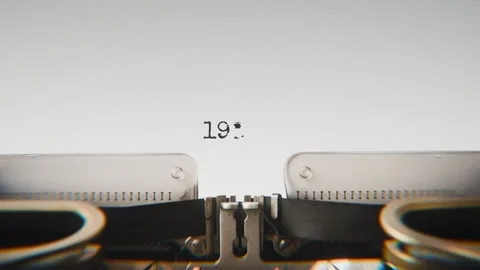 Old mechanical typewriter typing Year 1925 in a close-up view, with metal Stock Footage 321452496