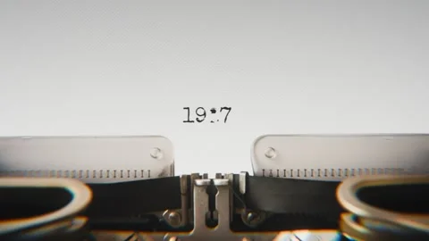 Old mechanical typewriter typing Year 1927 in a close-up view, with metal Stock Footage 321452509