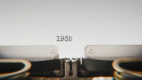 Old mechanical typewriter typing Year 1935 in a close-up view, with metal Stock Footage 321452580