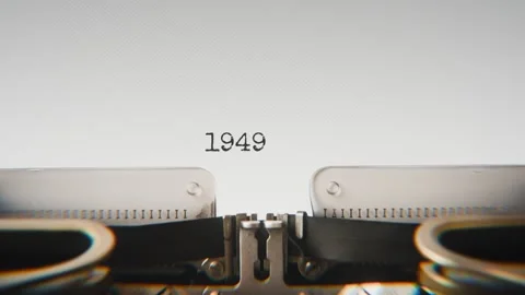 Old mechanical typewriter typing Year 1949 in a close-up view, with metal Stock Footage 321452648