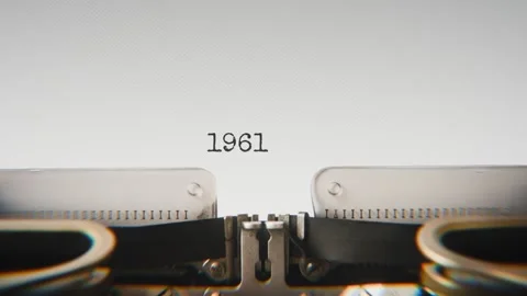 Old mechanical typewriter typing Year 1961 in a close-up view, with metal Stock Footage 321452729