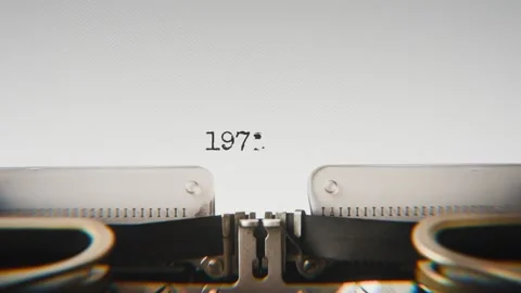 Old mechanical typewriter typing Year 1972 in a close-up view, with metal Stock Footage 321452800