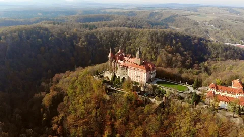 Old medieval castle surrounded by autumn forest Video stock 120581522