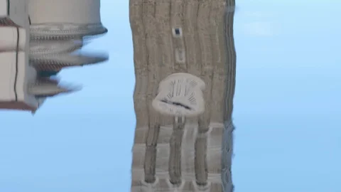 Old medieval clock tower reflection in water Stock Footage 101825546