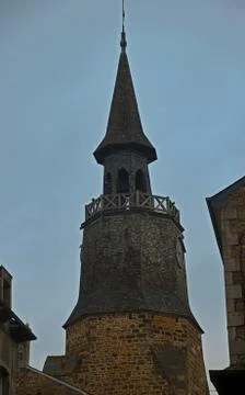 Old medieval stone clock tower in Dinan, France Stock Photos