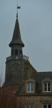 Old medieval stone clock tower in Dinan, France Stock Photos