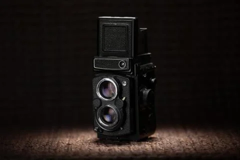 Old medium format camera under a spot light Stock Photos