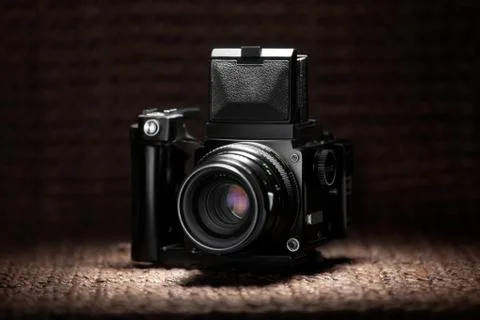 Old medium format camera under a spot light Stock Photos