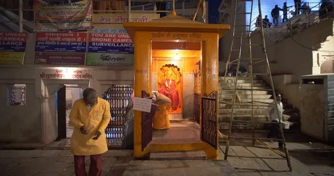 Old men doing prayers for Goddess in Hindu temple in Varanasi, India Stock Footage 113721141