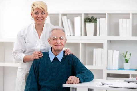 Old men with nurse Stock Photos