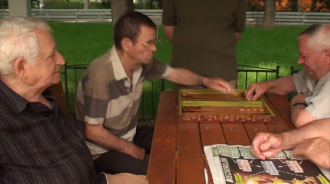 Old Men Playing Backgammon, Elderly, Retired, Park, Games, Paper News, Pan Shot Stock-Footage 39560041
