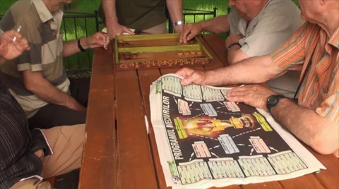 Old Men Playing Backgammon, Elderly, Retired, Park, Games, Paper News, Tilt Shot Stock Footage 39560043