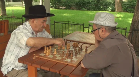 Old Men Playing A Chess Game, Elderly, Retired, Park, Still Shot Stock Footage 39558965