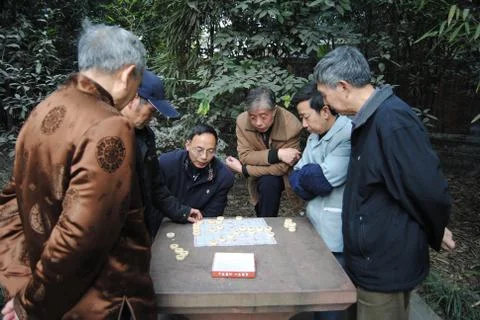 Old men playing Stock Photos