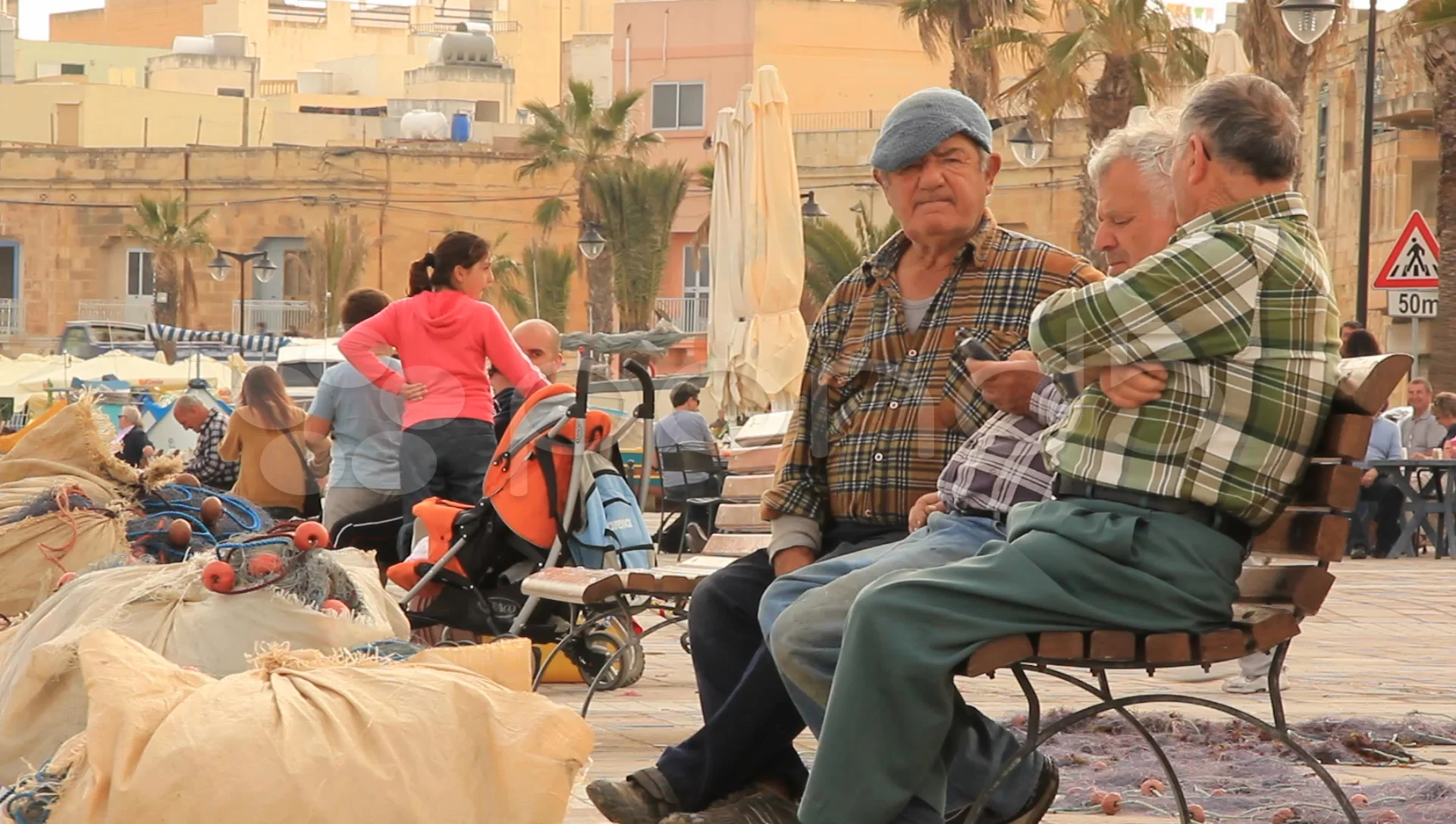 https://images.pond5.com/old-men-sitting-bench-malta-002474846_prevstill.jpeg