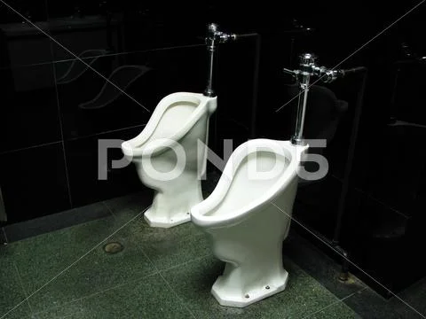 Old mens room Stock Photos