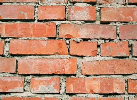 Old messy brick wall Foto stock