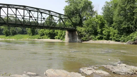 Old metal bridge over flowing river in Vermont Stock-Footage 25008355