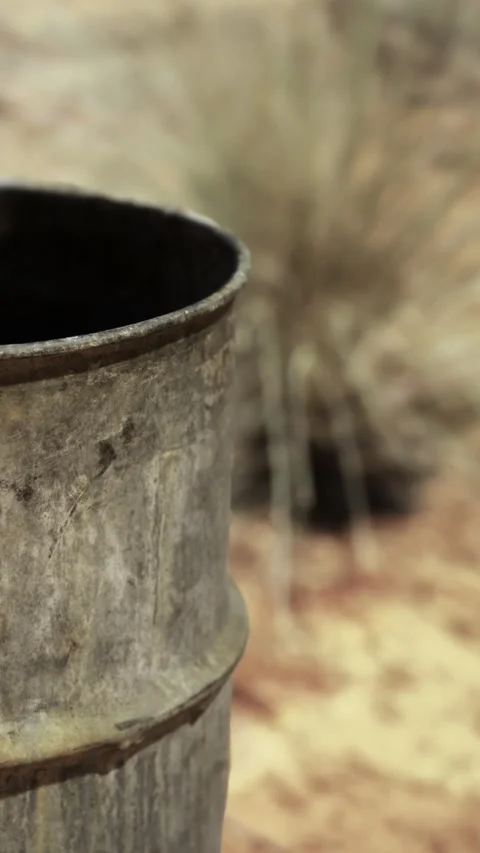 Old metal container in outdoor setting with natural background Stock Footage 334890446