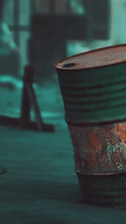 Old metal containers are placed on a wooden table Stock Footage 341036491