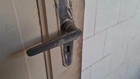 Old metal door handle motion footage showing rustic vintage texture details 스톡 동영상 339247439