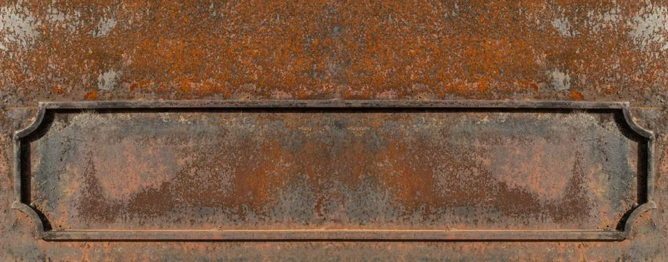 Old metal frame on eroded surface with heavy rust Stock Photos