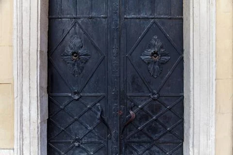 An old metal gate with decorative elements 스톡 사진