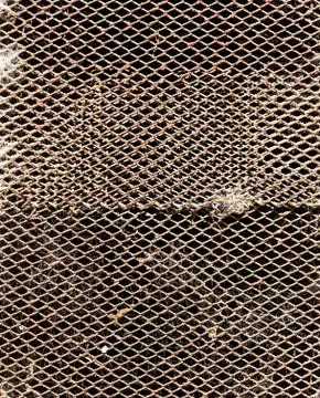 Old metal grid as a background Stock Photos