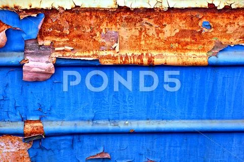 Old metal grunge texture with tatters Stock Photos
