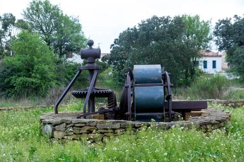 Old Metal Machine in Meadow Stock Photos