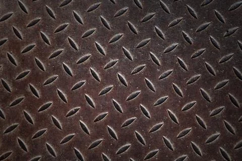 Old metal panel background texture with diamond pattern Stock Photos