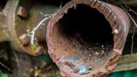 The old metal pipe Stock Photos