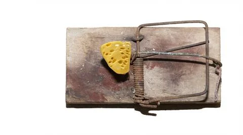Old metal spring type trap used to catch mice with cheese as bait to attrac.. Stock Photos
