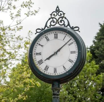 Old metal station clock Stock Photos