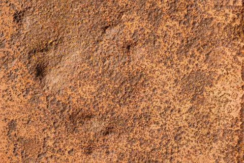 The old metal surface is corroded by rust under the influence of time and the Stock Photos