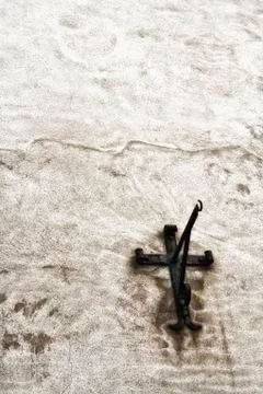 Old metal wall bracket with a hook Stock Photos