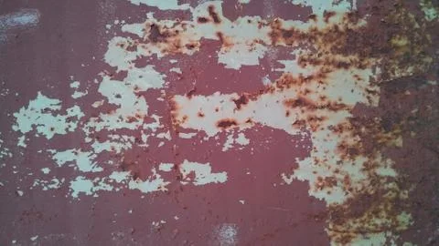 Old metal wall damaged by rust. Close up shot. Stock Photos