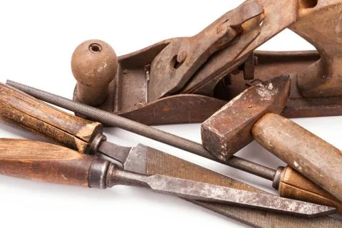 Old metal work hand tools with rust on white Stock Photos
