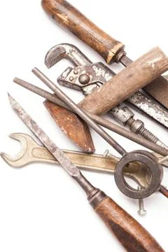 Old metal work hand tools with rust on white Stock Photos