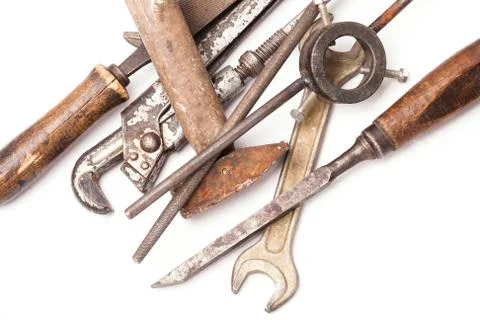 Old metal work hand tools with rust on white Stock Photos