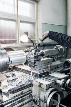 The old Metalworking machine, made in the middle of the last century, is still Stock Photos