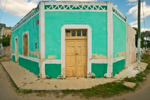Old Mexican village of Celestun on Gulf of Mexico with old green building Stock Photos