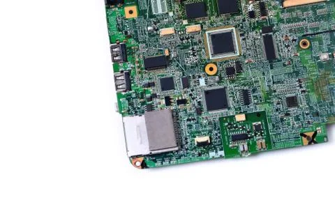 Old microcircuit from a laptop, background, on a white background Stock Photos
