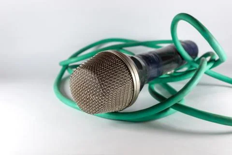 Old microphone with green cable Stock Photos