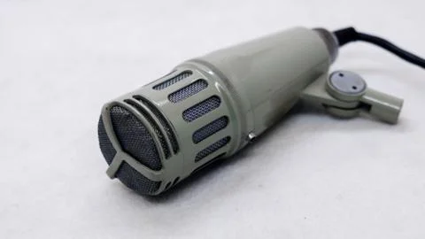 Old microphone on light background Stock Photos