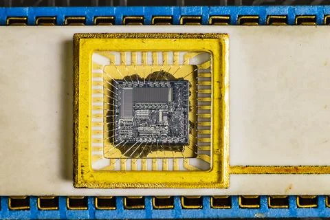 Old microprocessor with gold. Rare electronics pattern. Stockfoto's