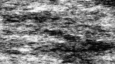 An old microscope. Black and white rough movable background. Stock Footage 241711380