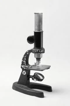 Old microscope for inspection and analysis of defects. Stock Photos