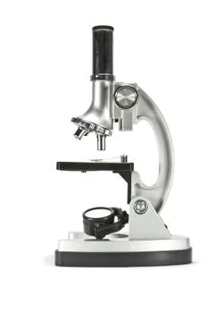 Old microscope isolated on white background Stock Photos